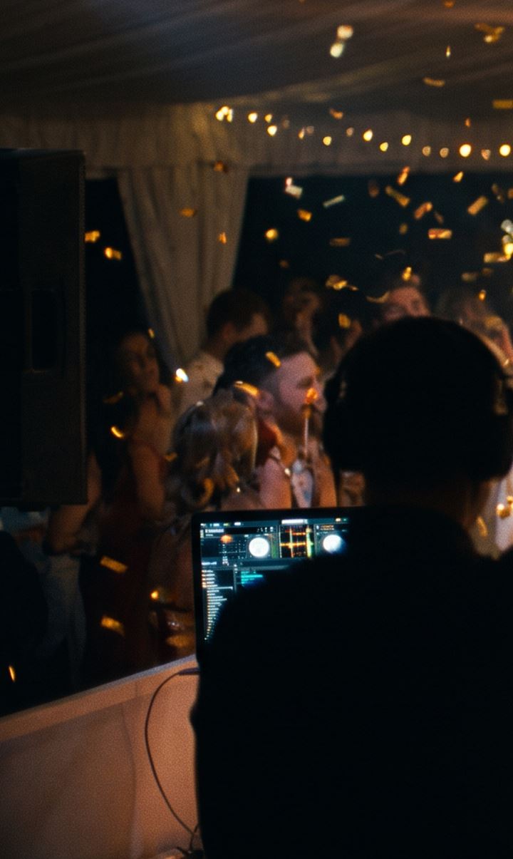 DJ silhouette over the booth