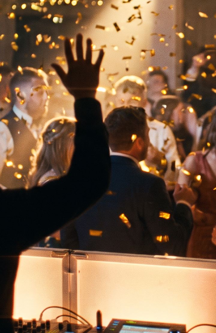 Guests dancing under confetti